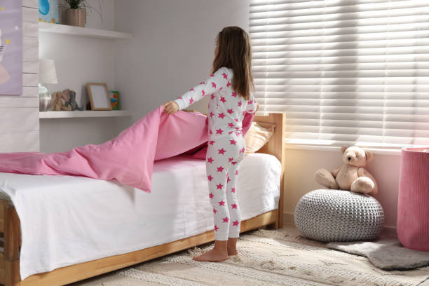 2,800+ Girl Making Bed Stock Photos, Pictures & Royalty-Free Images - iStock | Toy, Boy getting dressed