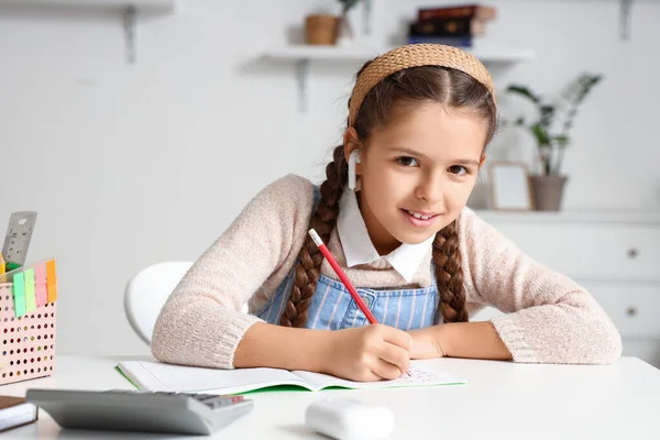 Little Girl Doing Homework Table Color Background — Stock Photo © serezniy #510331278